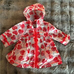 Catimini raincoat with red hearts size 6M